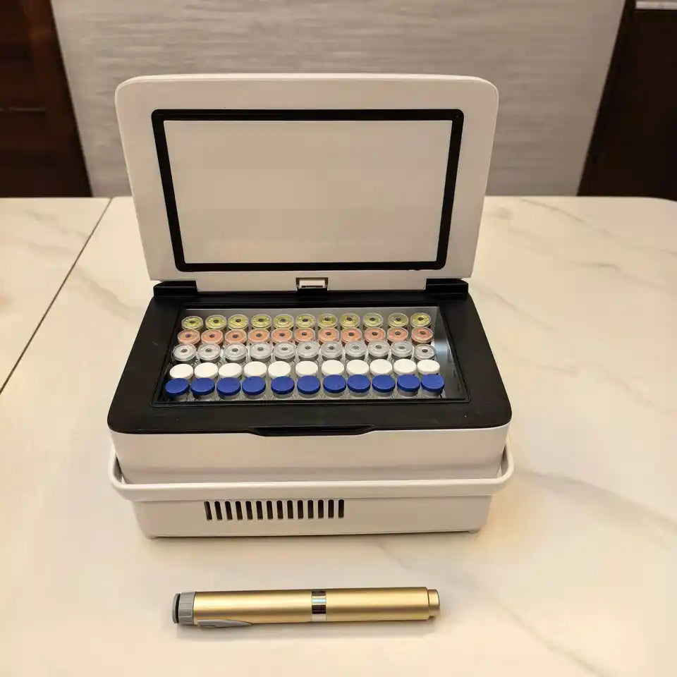 Compact portable cooling fridge with a clear lid and slotted tray